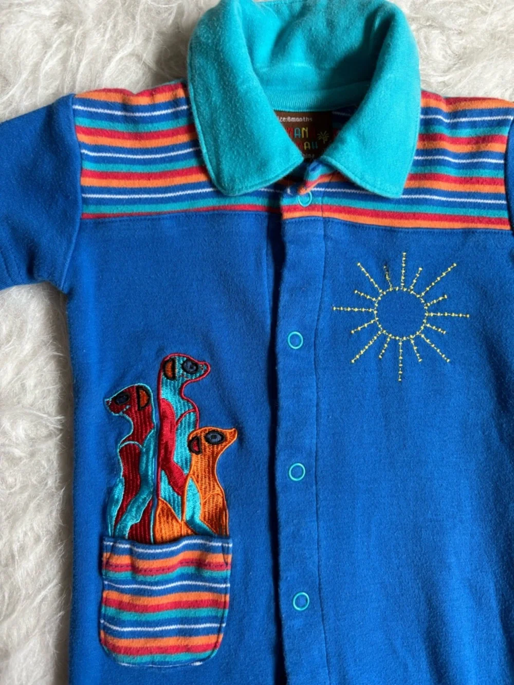 Vintage Banana Hannah Bright Blue Snap Romper with Vibrant Embroidery